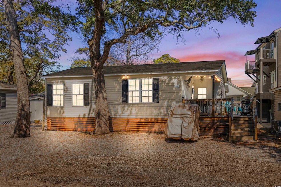 View of front of property featuring a deck