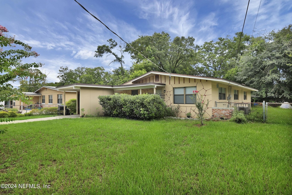 6886 Tom Thumb Dr, Jacksonville, FL 32210 - photo 1