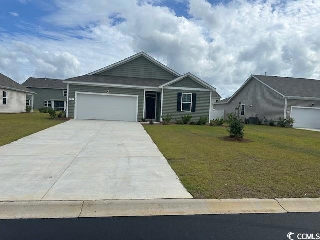 View of front of house featuring a garage and a fr