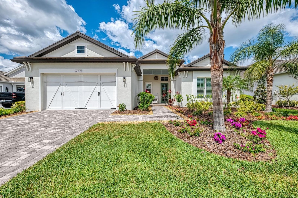Welcome to 749 Tailwind Place in Lakehouse Cove on Waterside Lakewood Ranch.