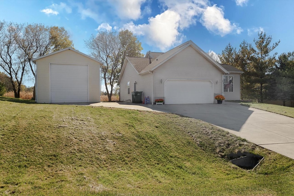 Front of House and over sized garage