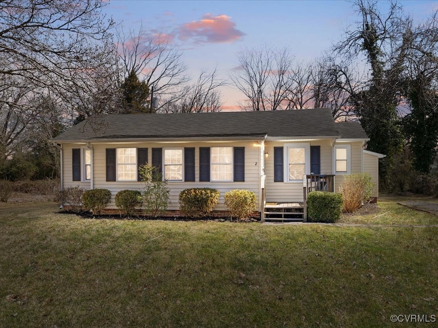 Ranch-style house featuring a lawn
