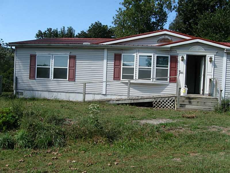 Exterior Front. With a handicap ramp