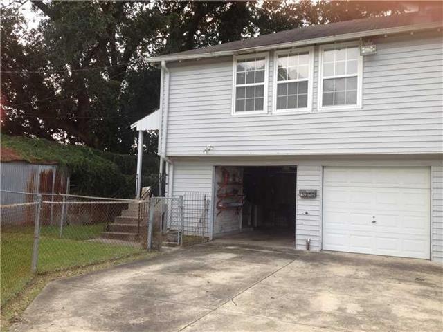 Photo. Large one bedroom apartment over garage. Comes with one garage space and small yard.