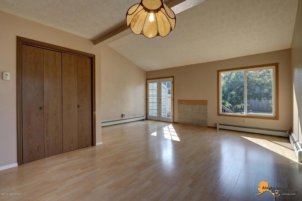 Open living room w/ vaulted ceilings!