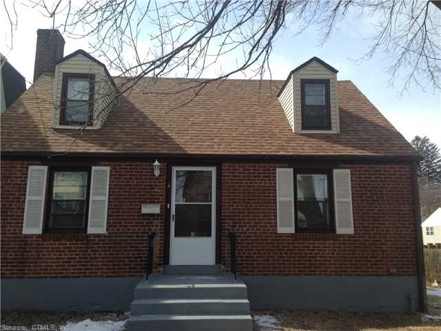 Exterior Front. Maintenance free brick and Brand n