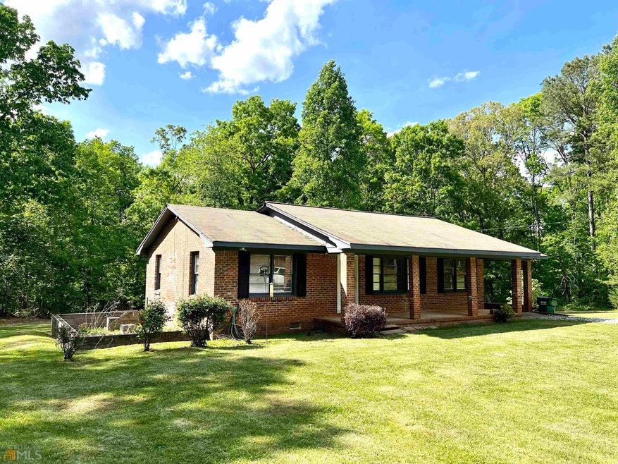 6495 Dicks Hill Pkwy, Mount Airy, GA 30563 - photo 1