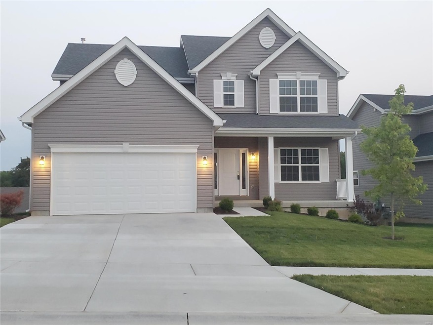 FRONT ELEVATION SHOWING EXPANDED DRIVEWAY