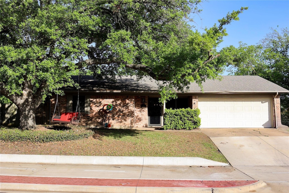 Single story home featuring an attached garage, co