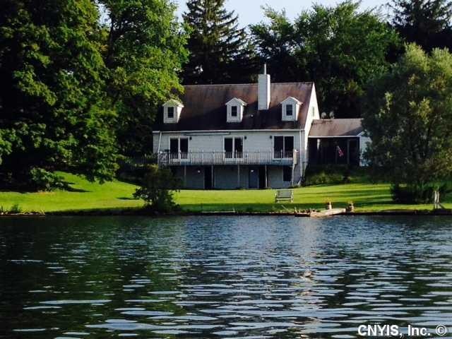 Exterior Front Outstanding waterfront Cape Cod wit