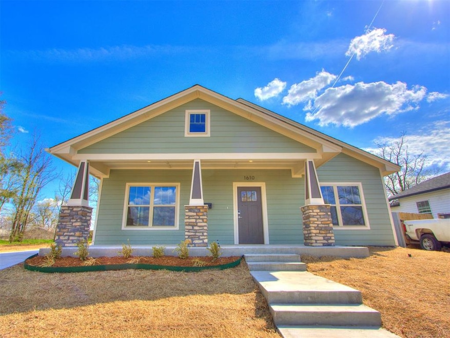 View of front of home featuring covered porch and 