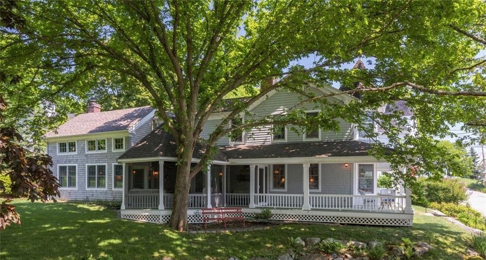 Side yard with beautiful trees.