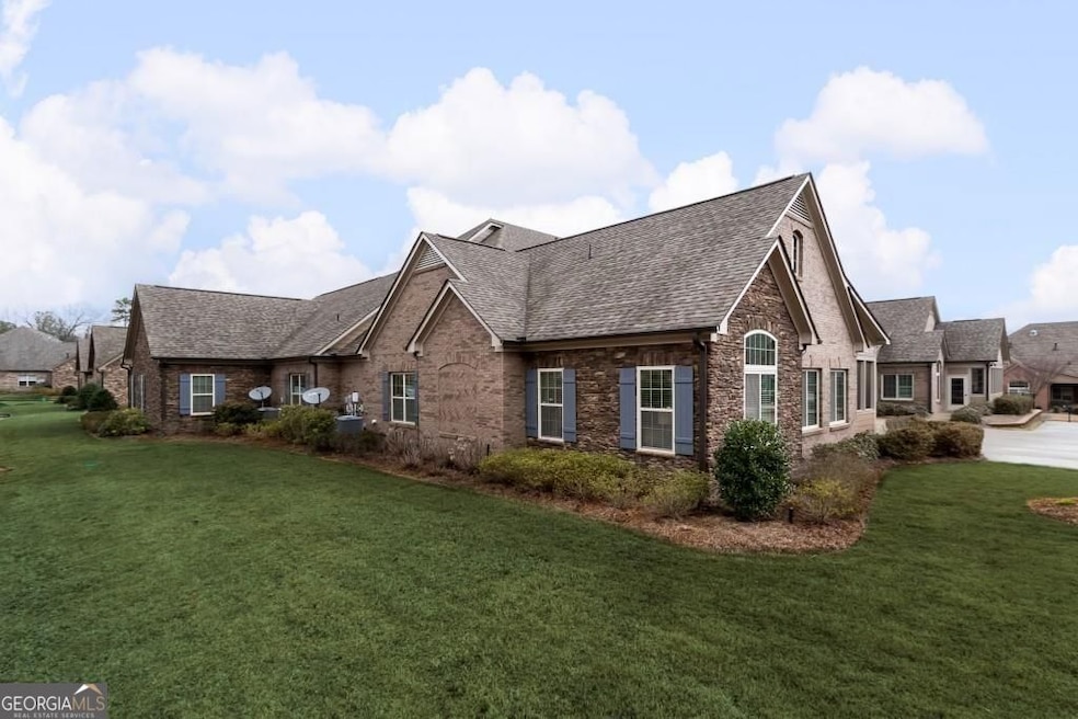 Beautiful Villa Home in award winning LIFESTYLE community. This home feels like a detached home with the surrounding green space!