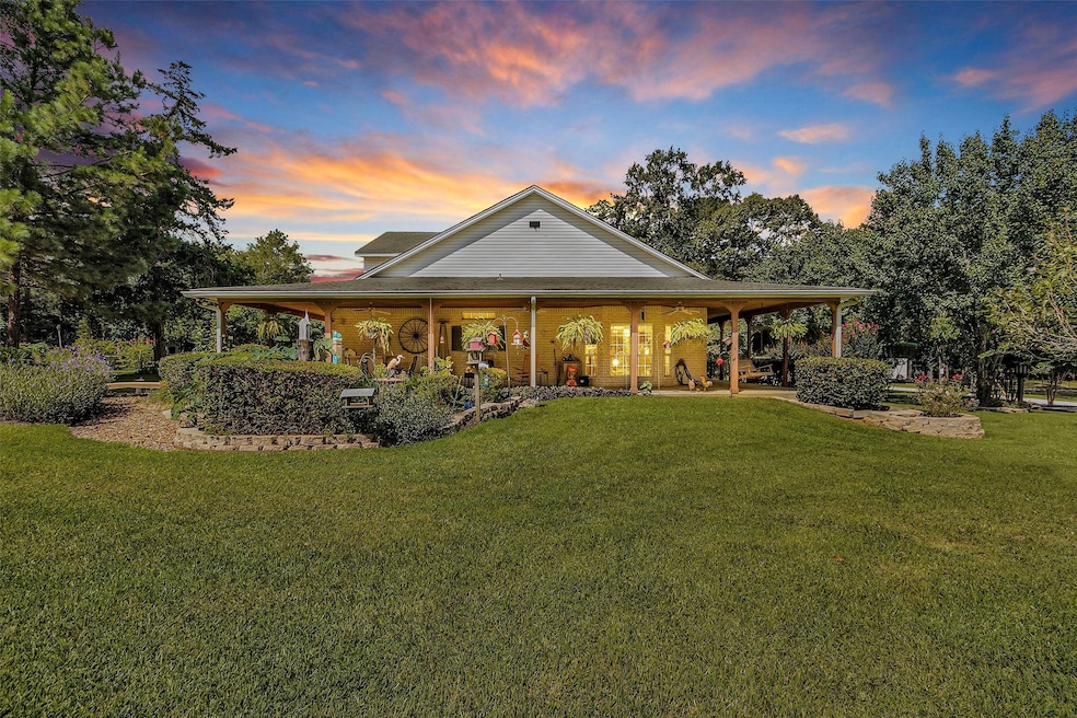 Sprawling 18+ unrestricted acres in Livingston boasting a main home, guest house, pool, several outbuildings & endless possibilities!