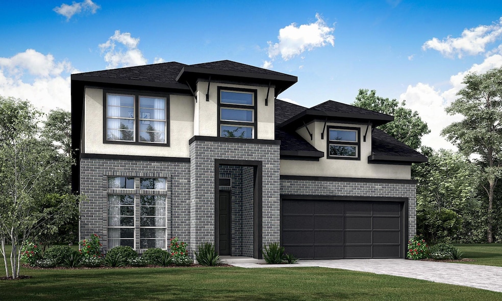 View of front of house with stucco siding, brick 