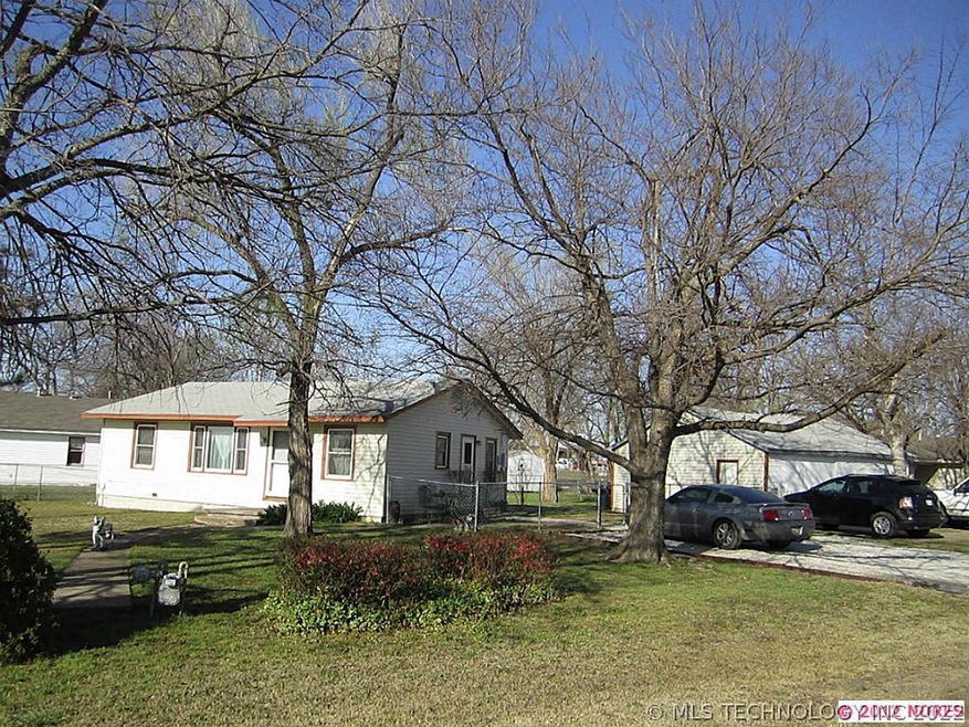 Beautiful home on 2m/l city lots!  Detached garage