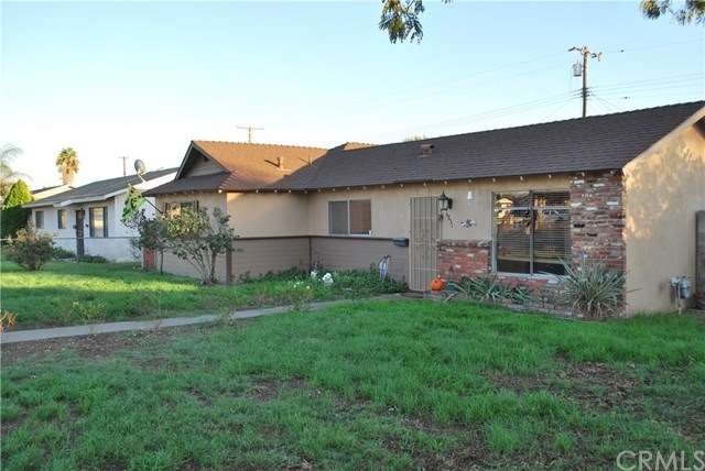Newly landscaped front yard now has full green gra