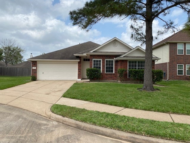 Delightful curb appeal with a pristine lawn & welc
