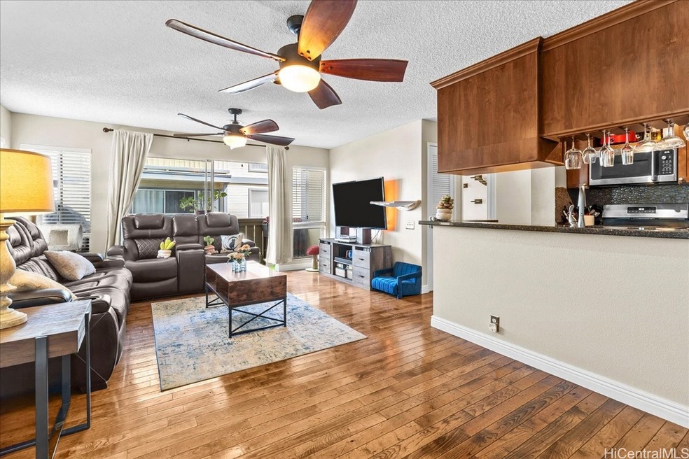 Premium finishes including hardwood floors and gra