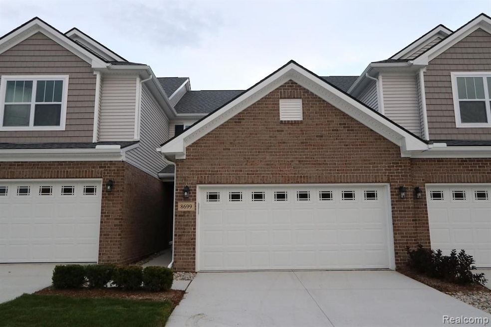 8699 Pioneer St unit 4, Washington, MI 48094 - photo 1