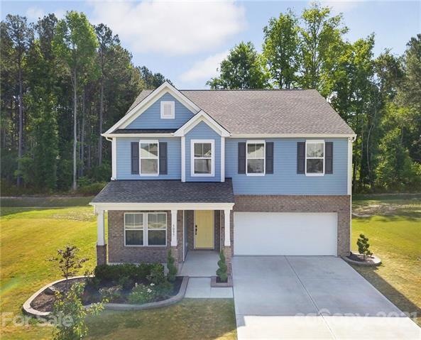 Welcome home!  This beautiful house backs up to tr