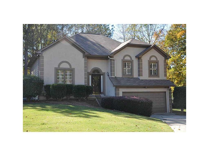 Exterior Front. Lovely hardcoat stucco front home 