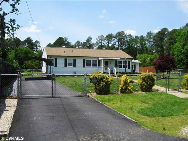 Exterior Front - Front view of home-carport has be