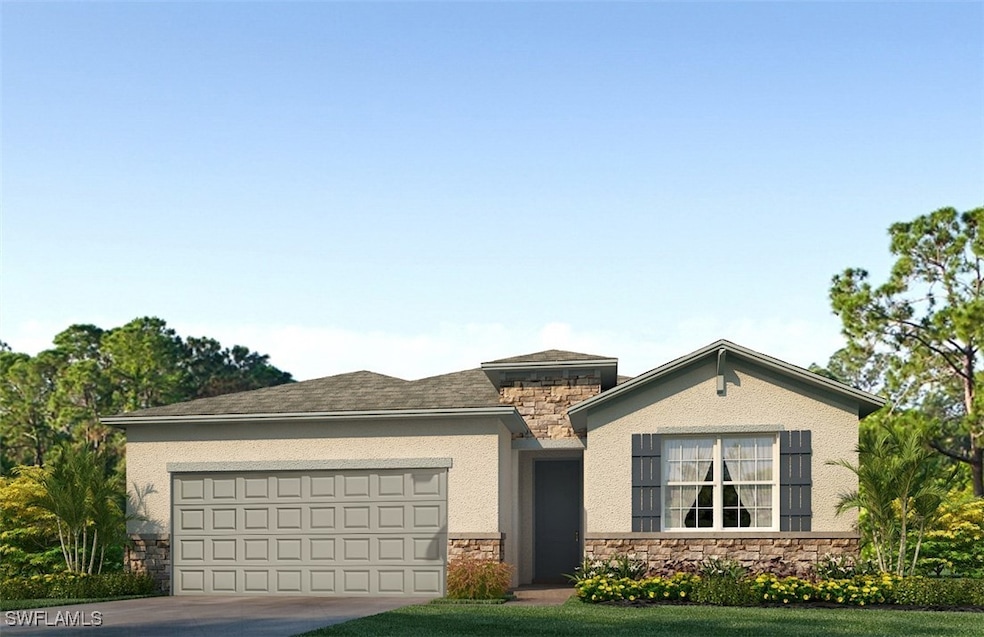 View of front of house with stone siding, a garage