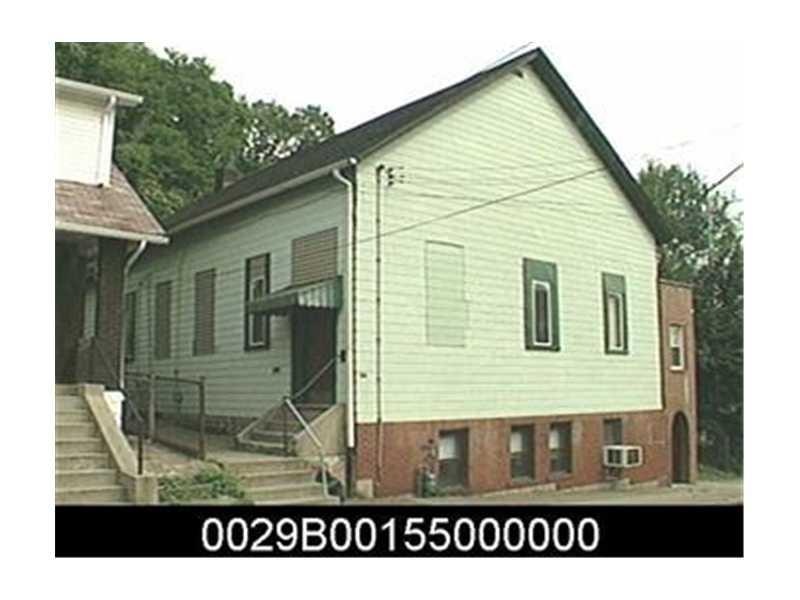 Exterior Front. County picture, now has new tin ro