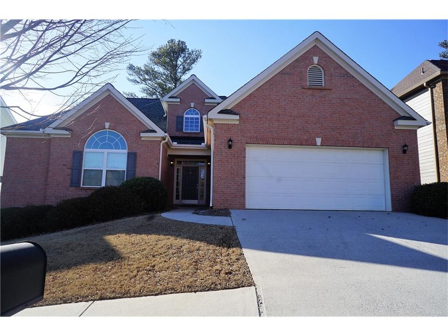Stately ranch sits pretty with professional landsc