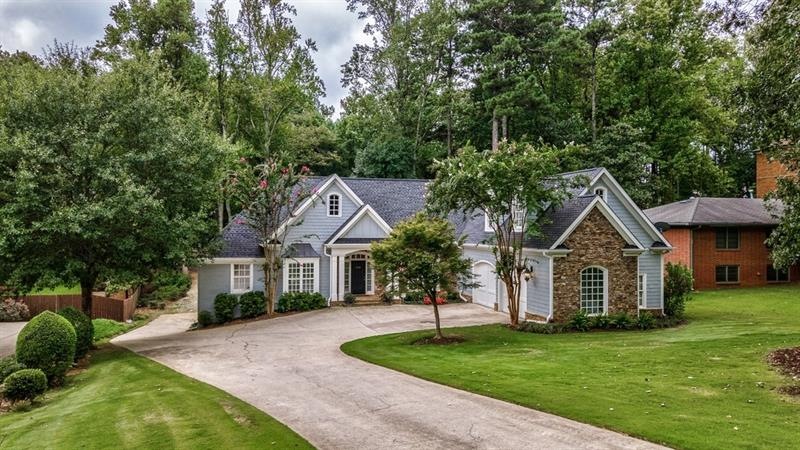 Spacious and warm shingle, painted brick, and natu