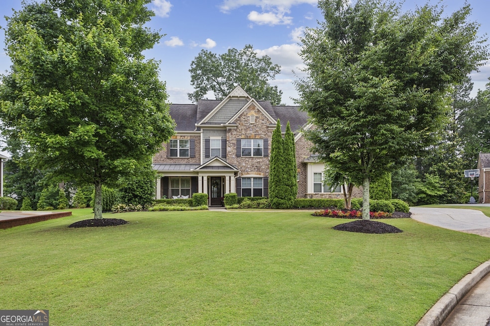 Welcome to your Dream Home in the heart of East Cobb, nestled in the highly sought-after Swim & Tennis Community of Mabry Manor.
