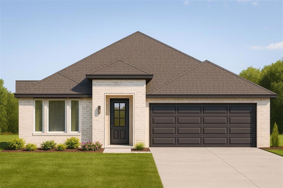 View of front of property with brick siding, driveway, a front lawn, and an attached garage
