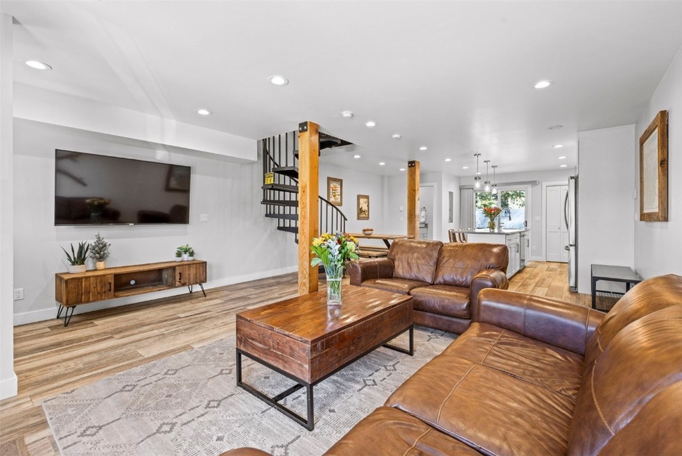 Living area featuring recessed lighting, stairway,