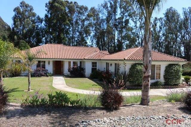 Front view of this beautiful home.  Beautiful land