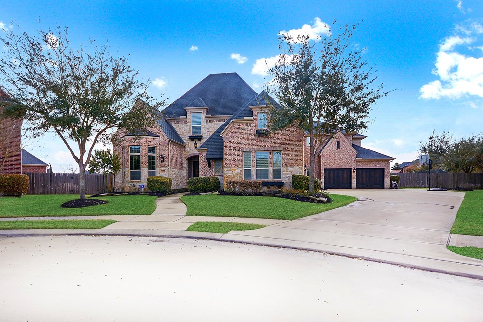 Spectacular .56-acre Lake Lot home on corner cul-de-sac.