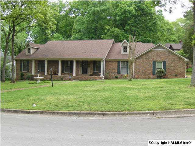Front view of home. Large yard and new landscaping.
