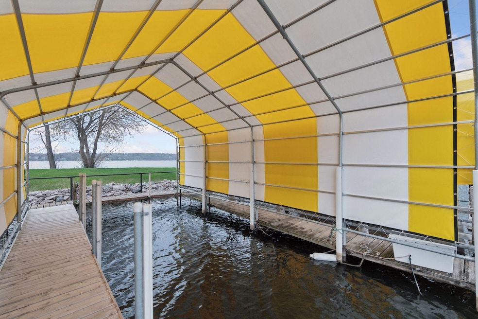 A newer LAKE MINNETONKA private permanent 32 FT dock is dedicated to the condo address of 5420 Three Points Blvd, #232, Mound MN 55364