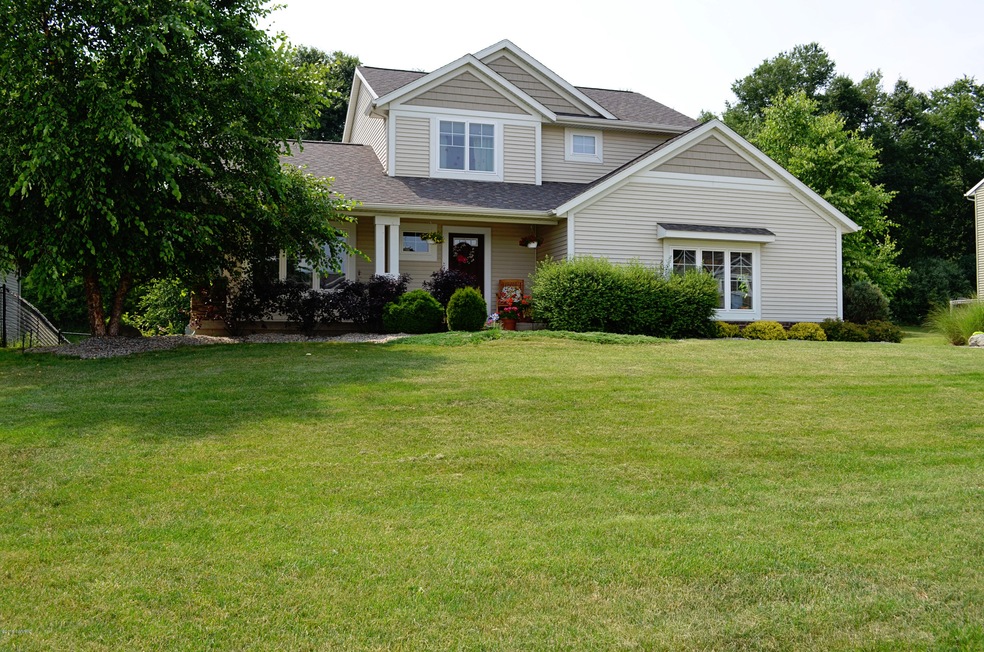 853 Soren Ct SE unit 5, Lowell, MI 49331 - photo 1