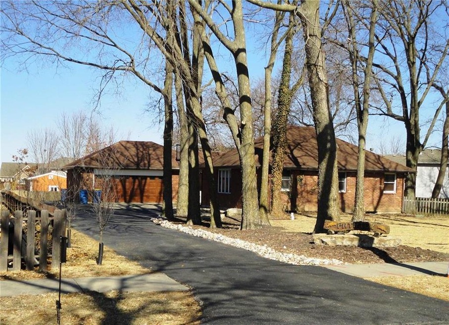 All brick ranch on a secluded treed lot.