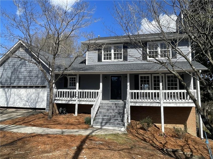 View of front facade featuring covered porch and a