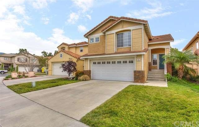 Home boasts beautiful curb appeal and long drivewa