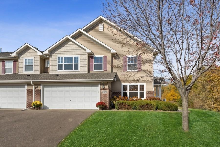 Welcome to 20372 Kensfield Trail of Lakeville! Large and spacious end unit beauty with extra deep, private, double stall garage and interior storage. Welcome Home!