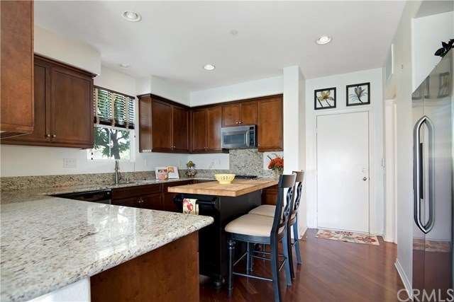 Fabulous gourmet kitchen with expansive granite co