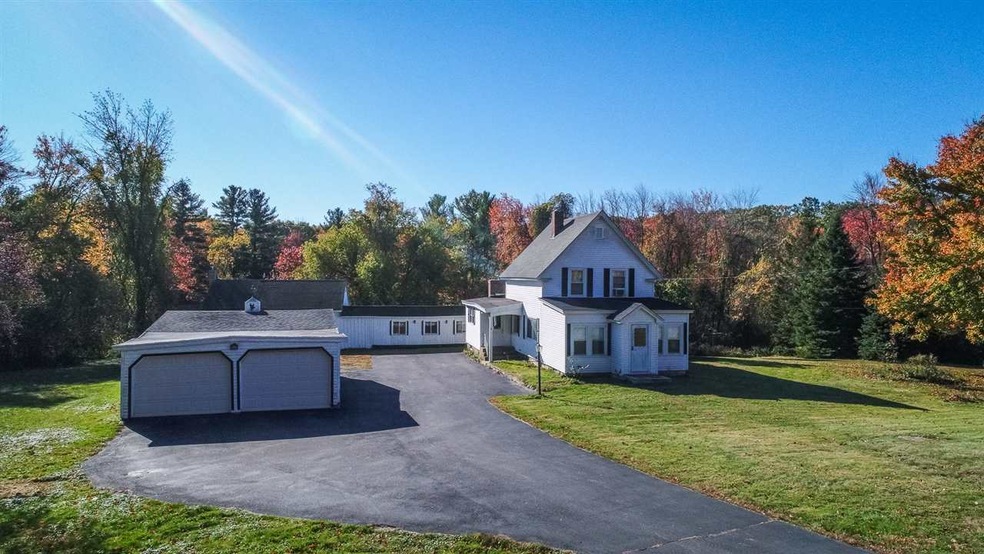 Main house, 3 bay garage & 2nd building behind the