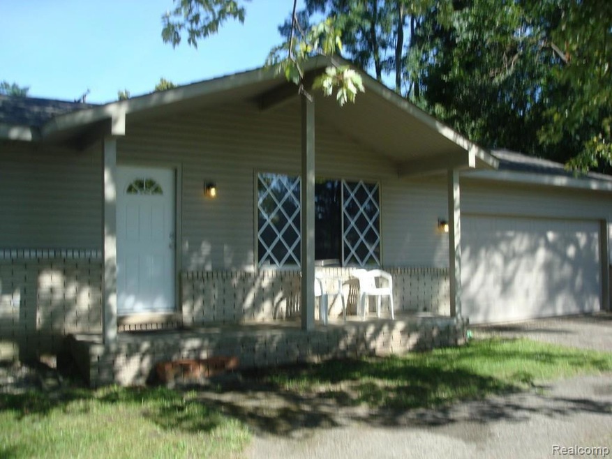 Ranch with porch and 2 car attached