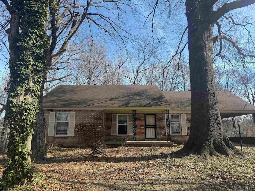 Single story home with a carport