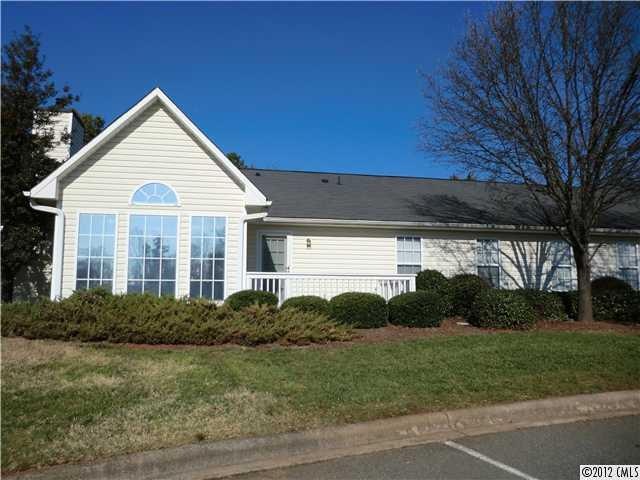 Exterior Front - Front elevation with sunroom on f