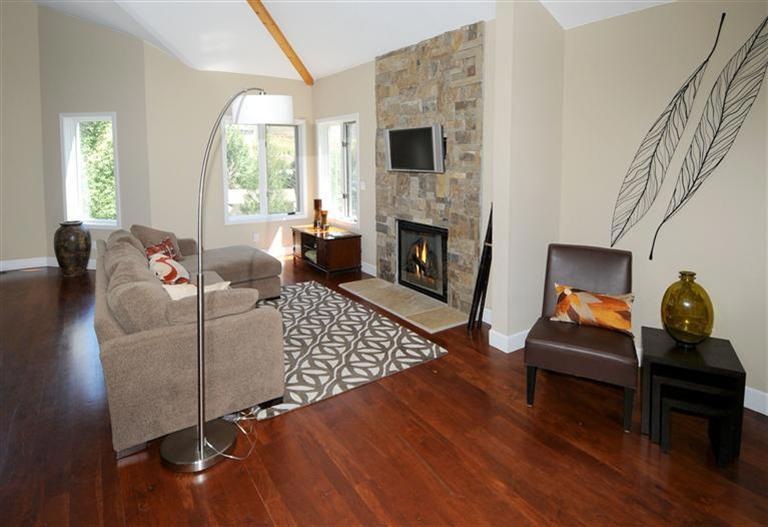 Spacious, sun drenched living room with