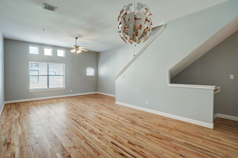 Living/Dining: Refinished wood flooring, fresh pai